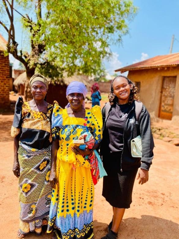 three women in rural setting