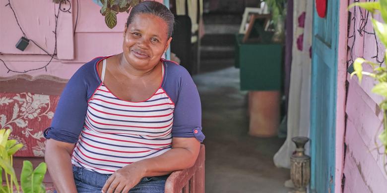 Before, the floor had cracks, a hole, and the entire floor was deteriorating. I used cement to patch the holes, but they always came back. Now I’m happy and thankful because I have a new floor. Thanks to Habitat, it’s clean and raised