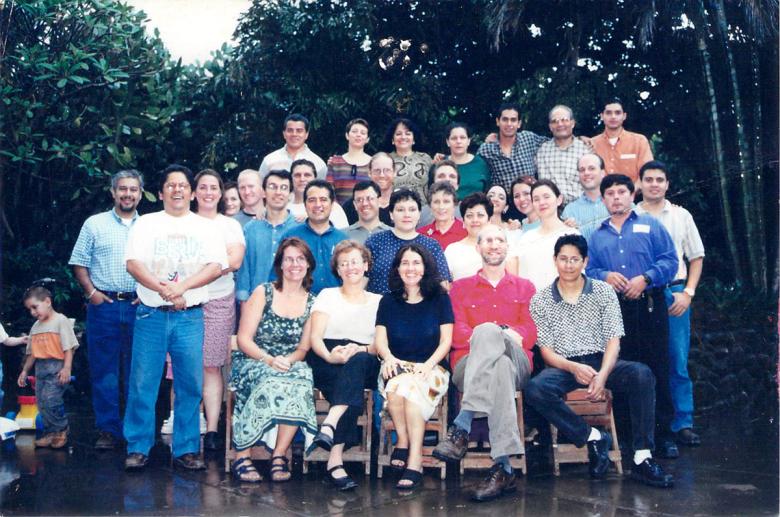 This photograph was taken in 2004 at Torre Nelson’s home during an Area Office staff gathering. Ernesto Castro is the young man in the orange shirt on the right side of the image. Also pictured are Gerardo Morales, Joselyne Hoffmann, and Juan Ochoa, who continue to work at the Area Office today